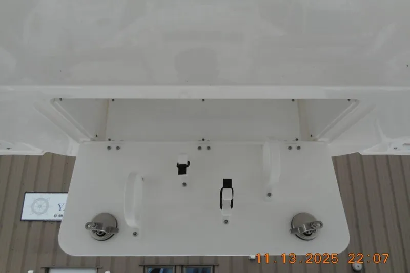 Slide: The Image of Underside view of 2025 Sea Fox 288 Traveler boat, showcasing mounting hardware. - 19