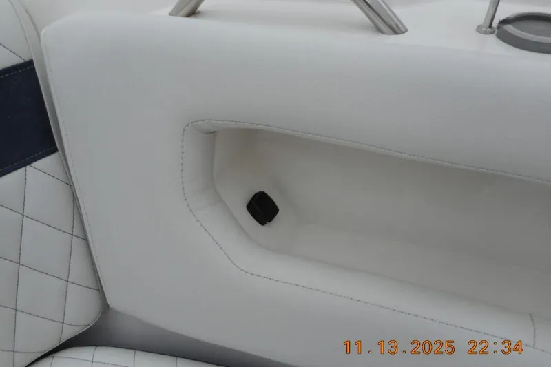 Slide: The Image of White interior detail of 2025 Sea Fox 288 Traveler boat with cup holder. - 26