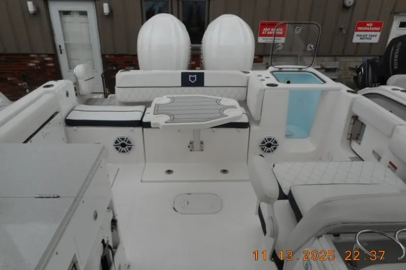 Slide: The Image of 2025 Sea Fox 288 Traveler boat interior with seating, storage, and amenities. - 28
