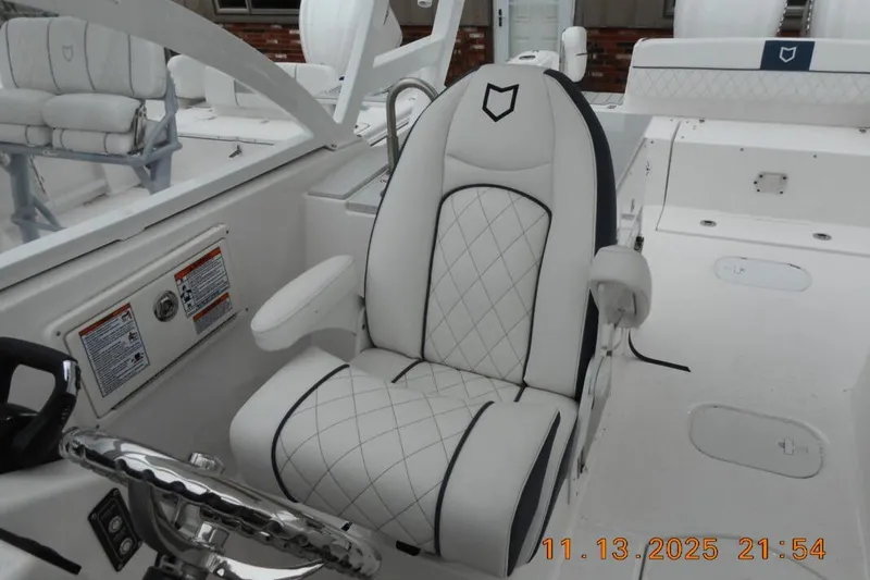 Slide: The Image of Luxury seating on 2025 Sea Fox 288 Traveler boat, featuring elegant white upholstery. - 5