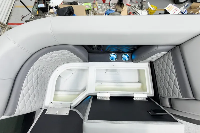 Slide: The Image of Luxurious seating and storage on 2026 Godfrey Monaco 25' Tritoon boat. - 17