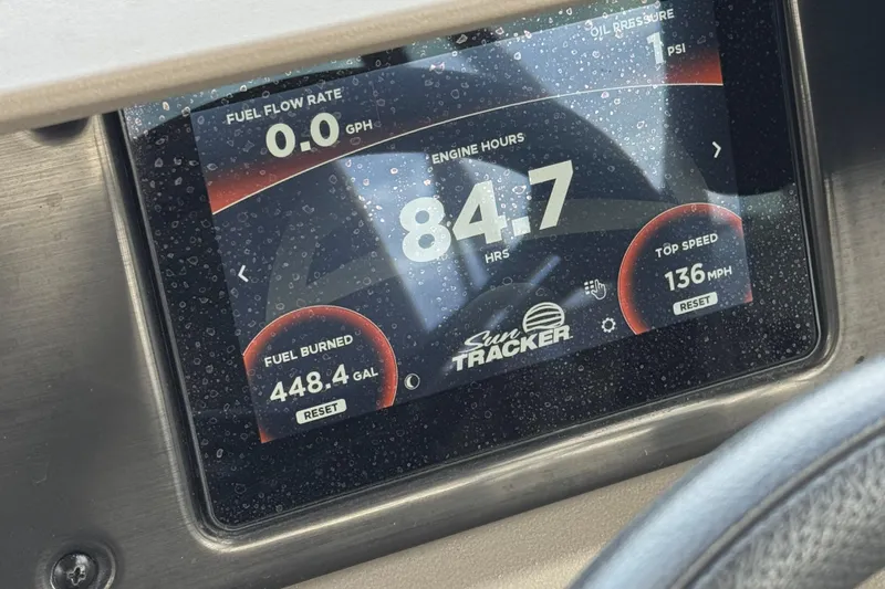 Slide: The Image of Dashboard display of 2024 Sun Tracker SportFish 22 DLX showing engine hours and fuel data. - 30