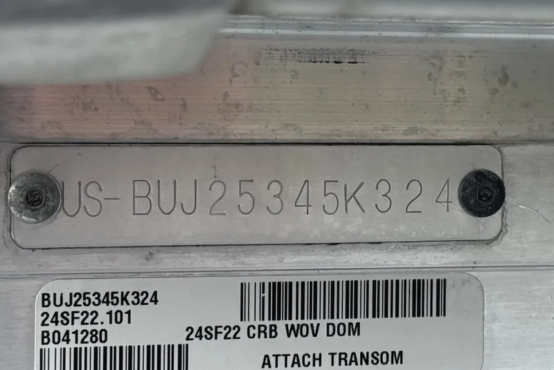 Slide: The Image of 2024 Sun Tracker SportFish 22 DLX hull identification number plate with serial details. - 36