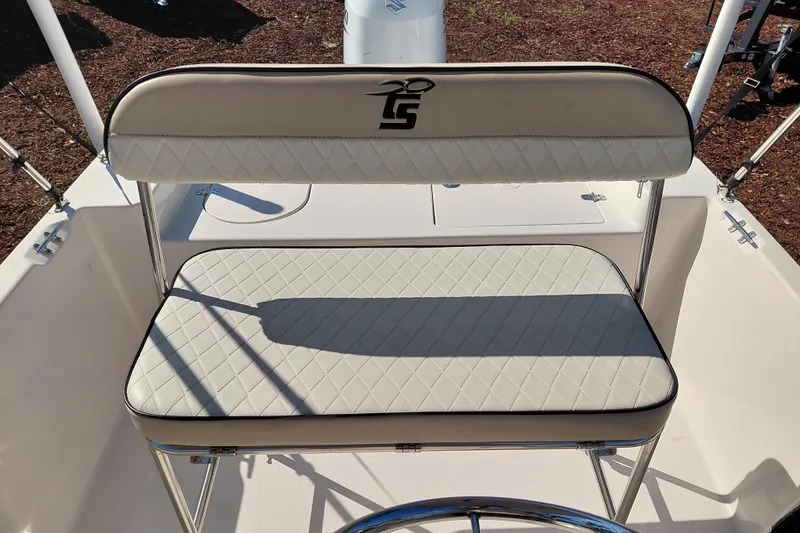 Slide: The Image of 2022 Carolina Skiff 178 JLS boat seat with quilted upholstery and logo. - 28