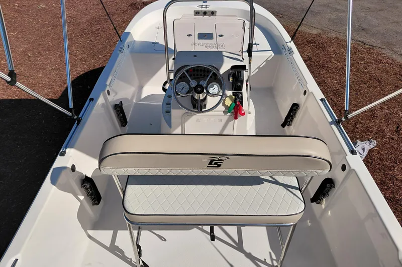 Slide: The Image of 2022 Carolina Skiff 178 JLS boat interior with steering console and seating. - 35