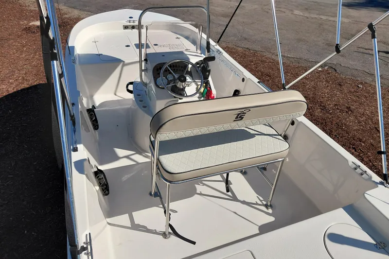 Slide: The Image of 2022 Carolina Skiff 178 JLS boat interior with steering console and seating. - 36