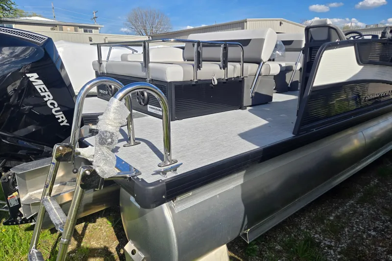 Slide: The Image of 2026 Princecraft Vectra 23 RL pontoon boat with Mercury engine, featuring spacious seating. - 2