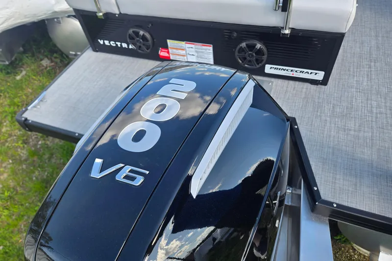 Slide: The Image of 2026 Princecraft Vectra 23 RL with 200 V6 engine, rear deck view. - 3