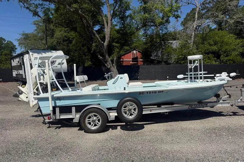 The Image of 2016 Beavertail Skiffs Vengeance boat on trailer, parked outdoors. - 1