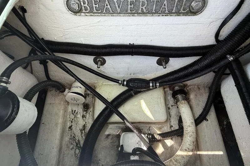 Slide: The Image of 2016 Beavertail Skiffs Vengeance boat wiring and plumbing details. - 14