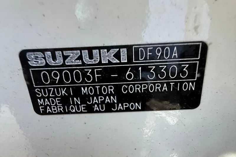 Slide: The Image of Suzuki DF90A engine label on 2016 Beavertail Skiffs Vengeance, made in Japan. - 25