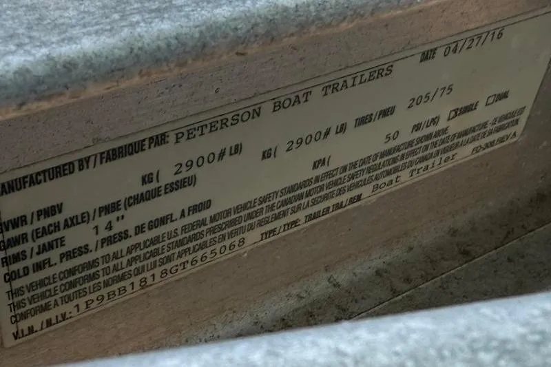 Slide: The Image of 2016 Beavertail Skiffs Vengeance label on Peterson Boat Trailers, showing specifications and VIN. - 26