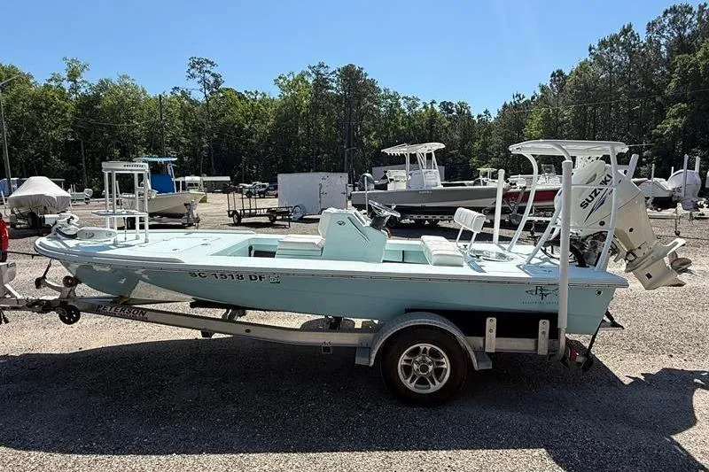 Slide: The Image of 2016 Beavertail Skiffs Vengeance boat on trailer in outdoor lot. - 5