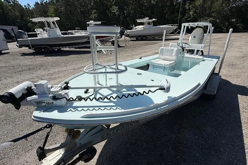 Slide: The Image of 2016 Beavertail Skiffs Vengeance boat on trailer, parked outdoors. - 6