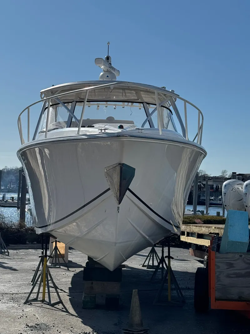 Slide: The Image of 2007 Fountain 38 Sportfish Cruiser docked at harbor. - 3