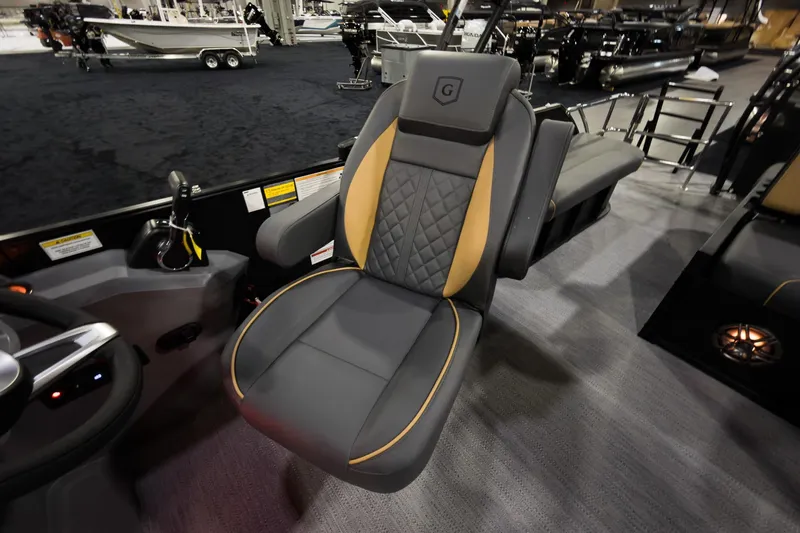 Slide: The Image of Luxurious seating on 2026 Godfrey Sweetwater 22' Tritoon boat, featuring elegant design and comfort. - 13