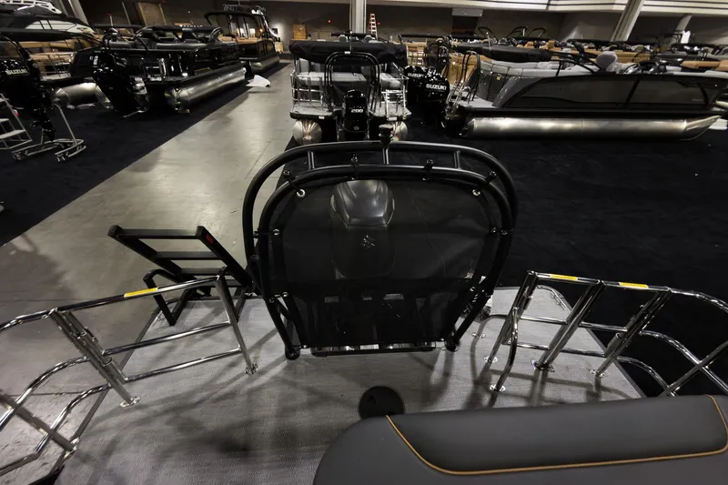 Slide: The Image of 2026 Godfrey Sweetwater 22' Tritoon boat interior at a showroom display. - 23