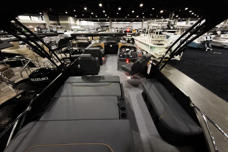 Slide: The Image of Interior view of 2026 Godfrey Sweetwater 22' Tritoon boat at a showroom. - 25