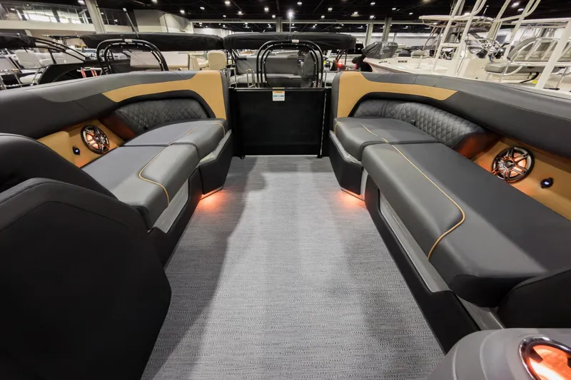 Slide: The Image of Luxurious interior of 2026 Godfrey Sweetwater 22' Tritoon with stylish seating and ambient lighting. - 27