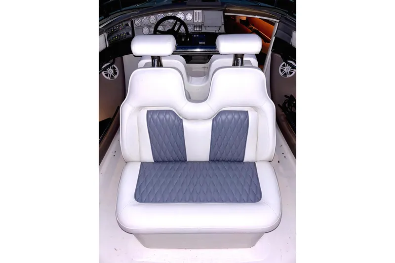 Slide: The Image of Luxury interior of 2005 Cobalt 343 boat with white and gray seating. - 10