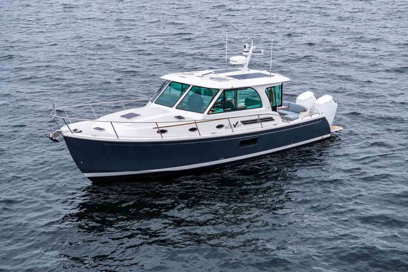 The Image of 2025 Back Cove 39O boat on open water, showcasing sleek design and modern features. - 1