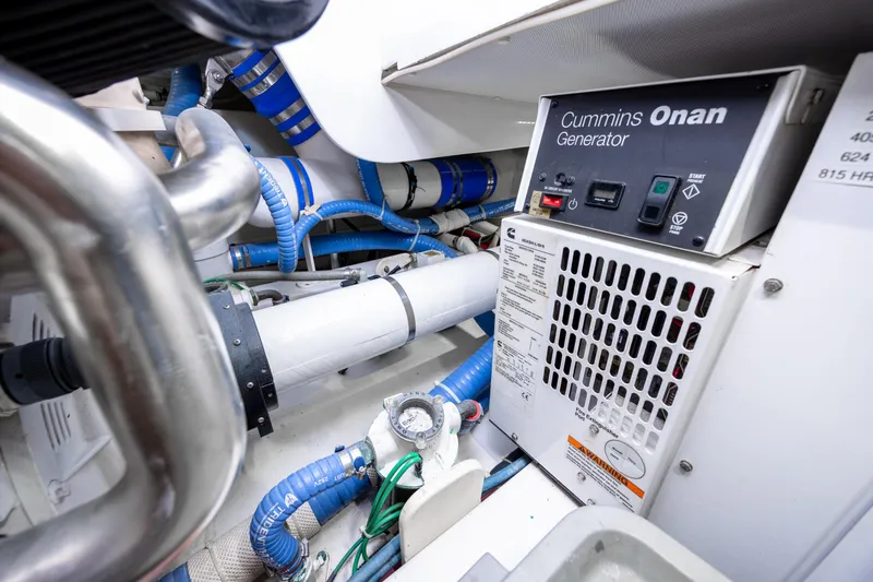 Slide: The Image of Engine room of 2015 Jarrett Bay Hardtop Express Sportfish with Cummins Onan generator. - 101
