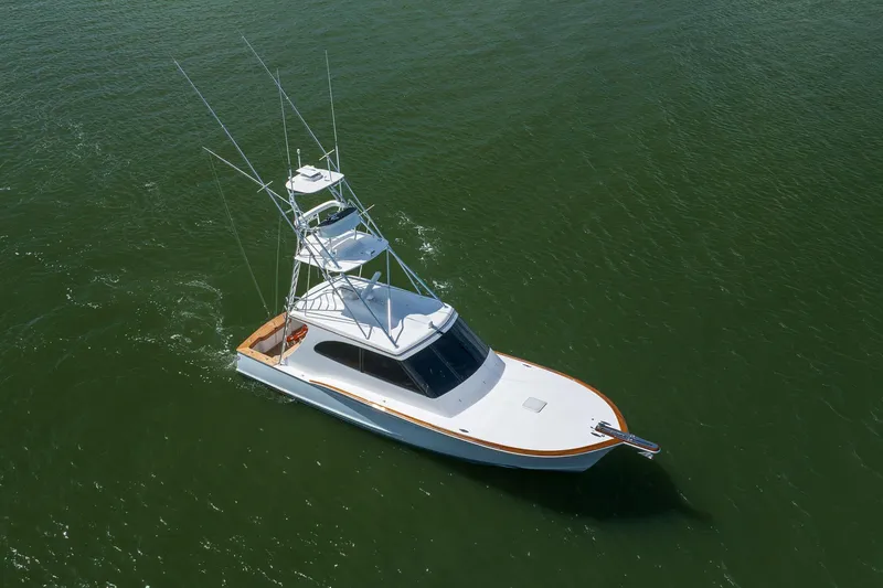 Slide: The Image of 2015 Jarrett Bay Hardtop Express Sportfish cruising on open water. - 112