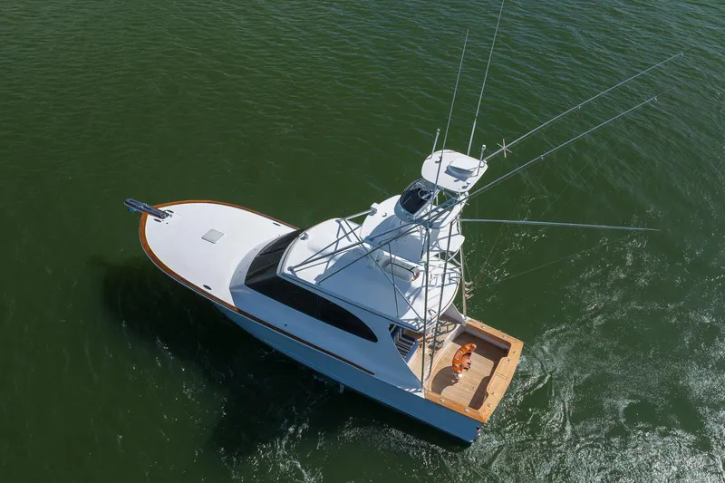 Slide: The Image of 2015 Jarrett Bay Hardtop Express Sportfish cruising on open water. - 113