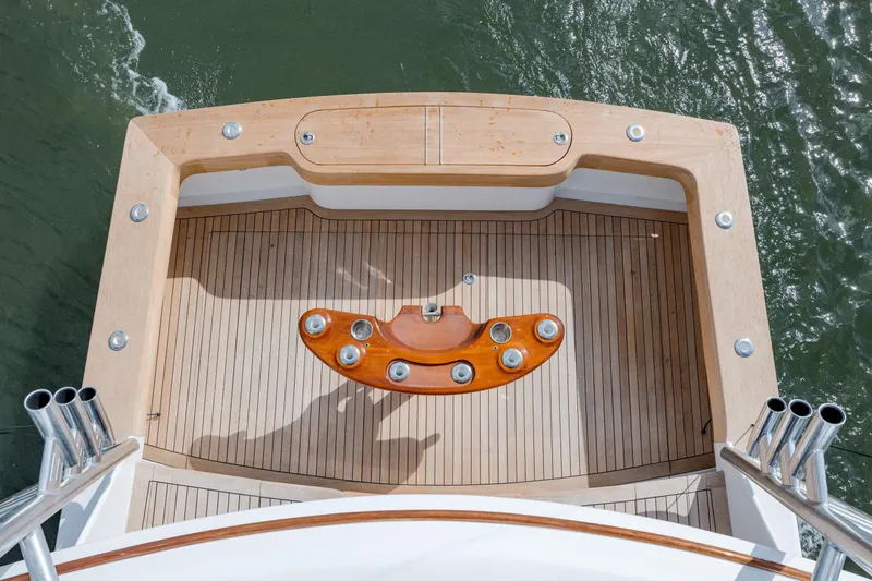 Slide: The Image of 2015 Jarrett Bay Hardtop Express Sportfish deck with rod holders, viewed from above. - 35