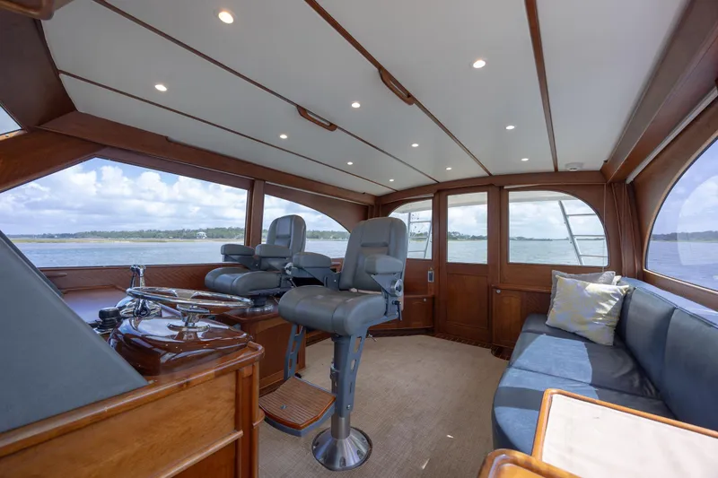 Slide: The Image of Interior of 2015 Jarrett Bay Hardtop Express Sportfish with luxurious seating and panoramic windows. - 45