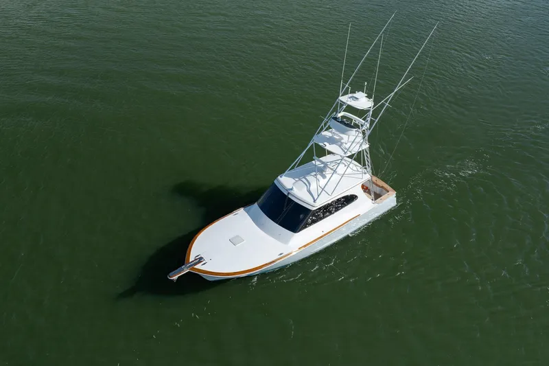 Slide: The Image of 2015 Jarrett Bay Hardtop Express Sportfish cruising on open water. - 69