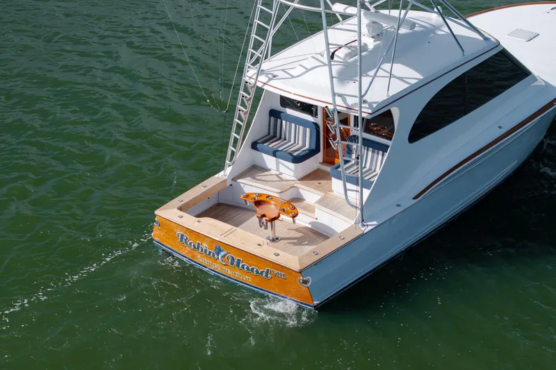 Slide: The Image of 2015 Jarrett Bay Hardtop Express Sportfish cruising on green water. - 70