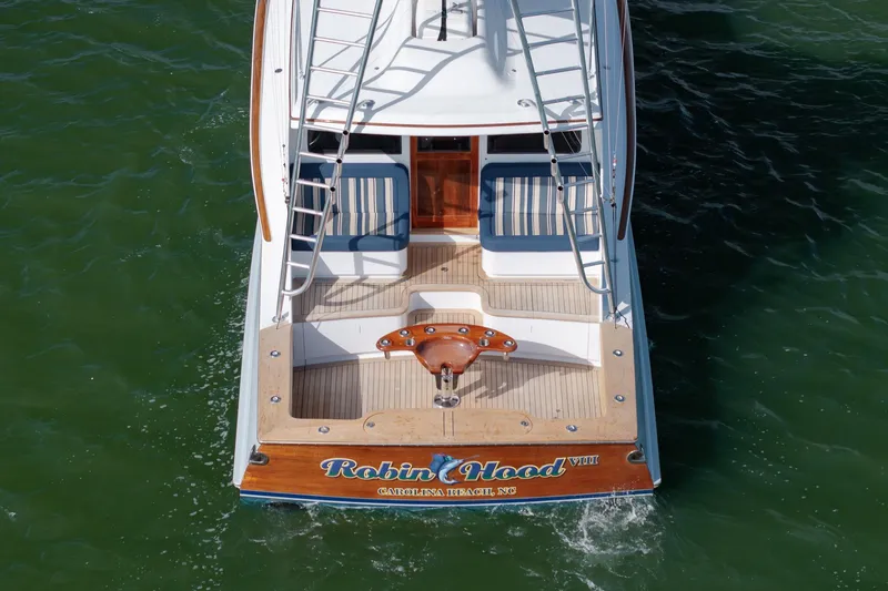 Slide: The Image of 2015 Jarrett Bay Hardtop Express Sportfish boat on water, rear view. - 71