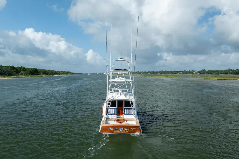 Slide: The Image of 2015 Jarrett Bay Hardtop Express Sportfish cruising on a scenic waterway. - 81