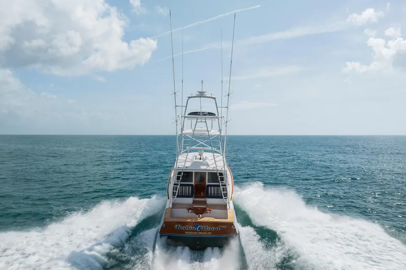 Slide: The Image of 2015 Jarrett Bay Hardtop Express Sportfish cruising on open ocean waters. - 85
