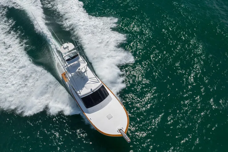 Slide: The Image of 2015 Jarrett Bay Hardtop Express Sportfish cruising on open water. - 90