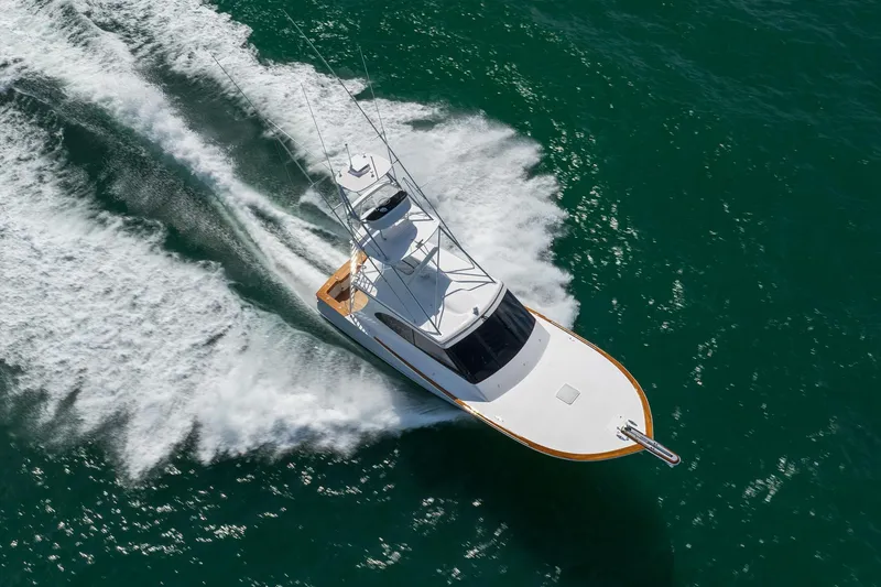 Slide: The Image of 2015 Jarrett Bay Hardtop Express Sportfish cruising on open water. - 91