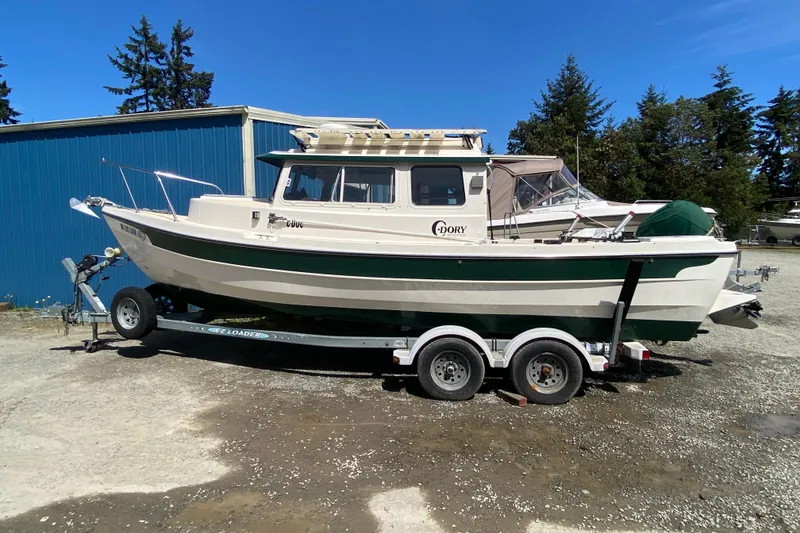Slide: The Image of Interior of a 1999 C-Dory 22' Angler boat with sink and stove. - 3