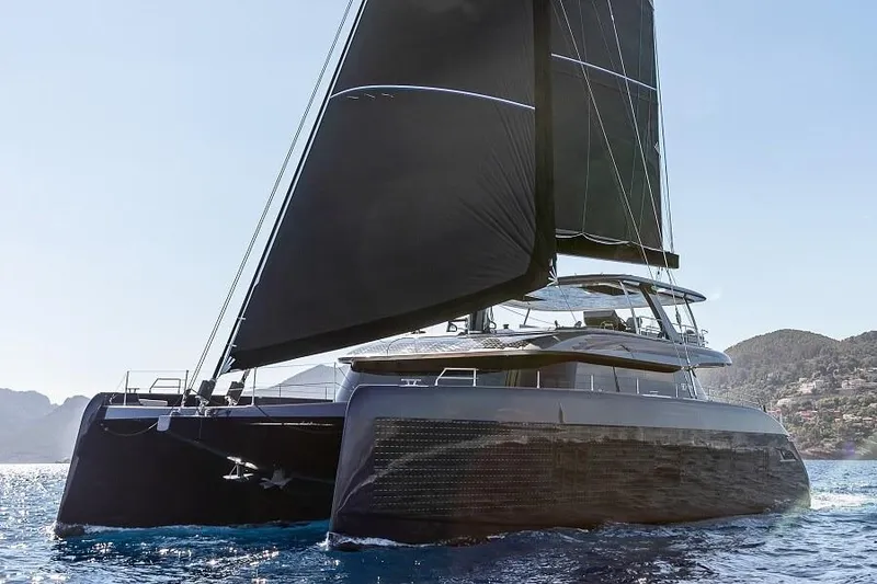 The Image of Luxury Sunreef 80 Sail catamaran from 2022 sailing on clear blue waters. - 0