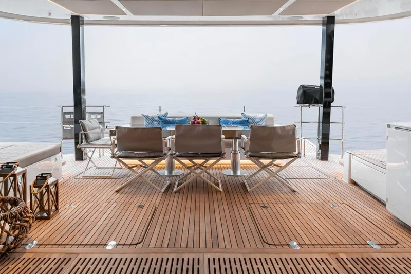 Slide: The Image of Luxurious Sunreef 80 Sail yacht deck with elegant seating, ocean view, and modern design, 2022 model. - 5