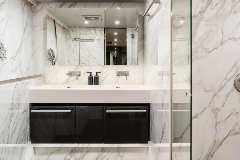 Slide: The Image of Luxurious bathroom with marble walls in 2022 Sunreef 80 Sail yacht. - 6