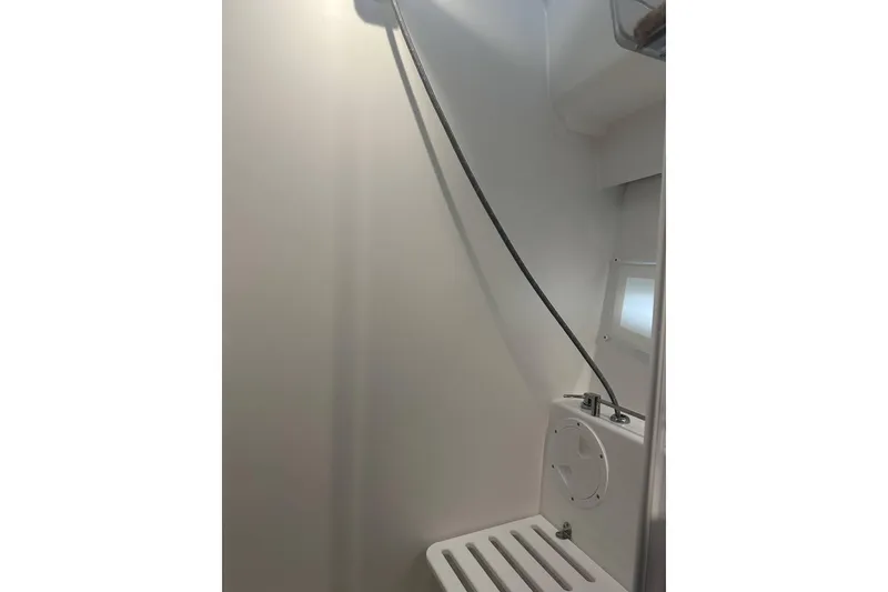 Slide: The Image of 2024 Jeanneau NC Weekender 1095 Fly interior shower area with modern fixtures. - 11