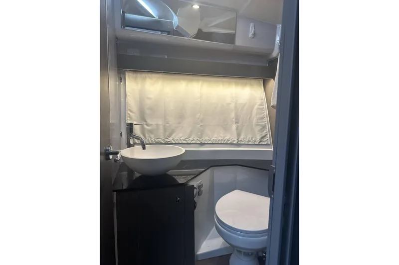 Slide: The Image of Modern bathroom interior of 2024 Jeanneau NC Weekender 1095 Fly yacht. - 12