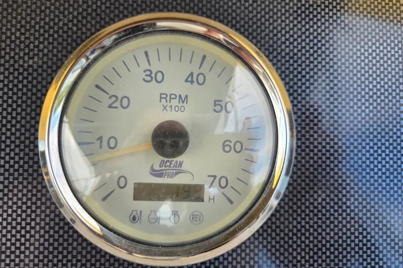 Slide: The Image of Tachometer displaying RPM on a 2022 Lexington 320, Ocean Pro branding visible. - 20