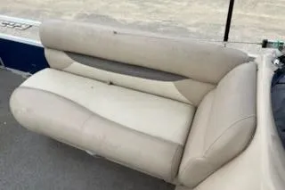 Slide: The Image of 2016 Sun Tracker Fishin' Barge 24 XP3 beige boat seating on deck. - 4
