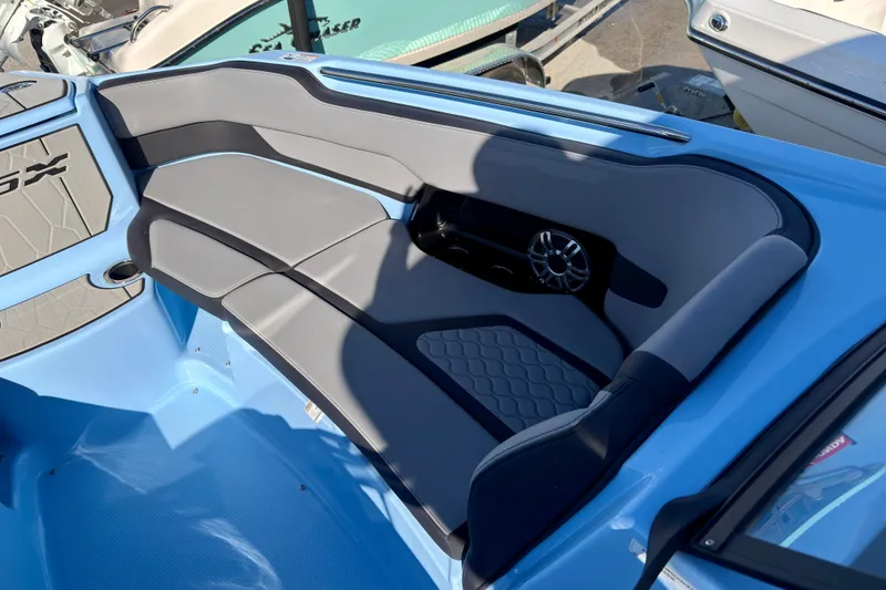 Slide: The Image of 2025 Yamaha Boats 255XD interior with sleek seating and modern design. - 16