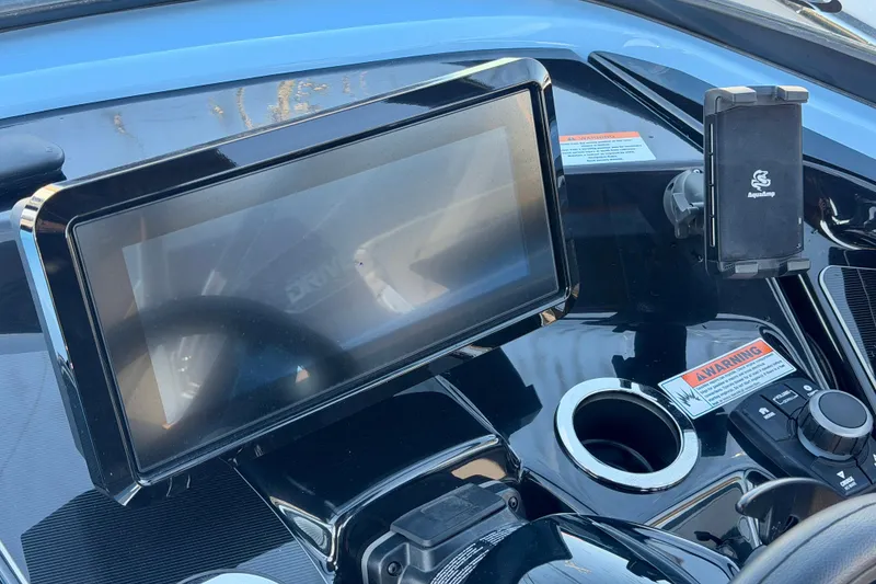 Slide: The Image of 2025 Yamaha Boats 255XD interior with modern seating and sleek design. - 19