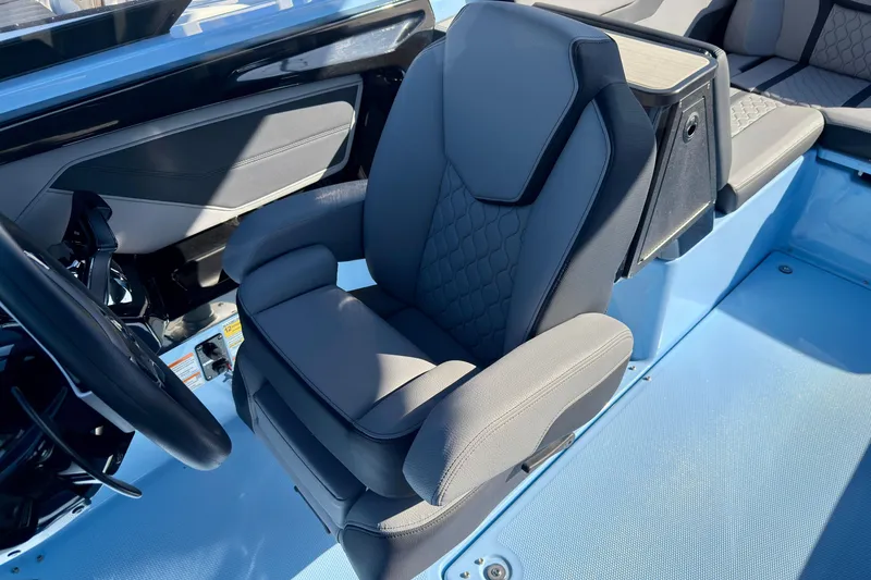 Slide: The Image of 2025 Yamaha Boats 255XD interior with luxurious seating and modern design. - 24