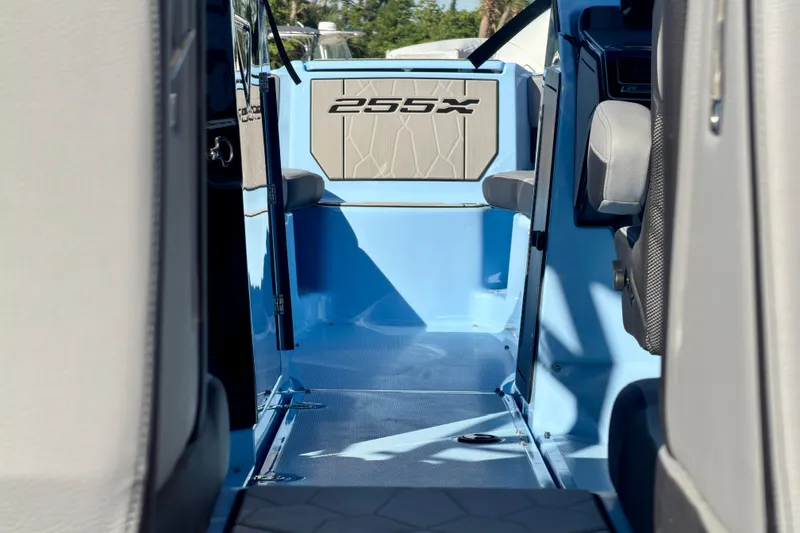 Slide: The Image of Wakeboard rack on 2025 Yamaha Boats 255XD against clear blue sky. - 26
