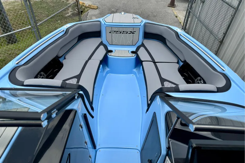 Slide: The Image of 2025 Yamaha Boats 255XD interior with sleek seating and modern design. - 5